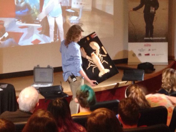 Biologist Victoria Howse from the Department of Fisheries and Oceans Canada shows students an 8.5 lb lobster while discussing the Eastport Marine Protected Area.