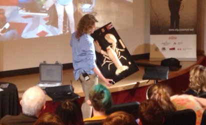 Biologist Victoria Howse from the Department of Fisheries and Oceans Canada shows students an 8.5 lb lobster while discussing the Eastport Marine Protected Area.